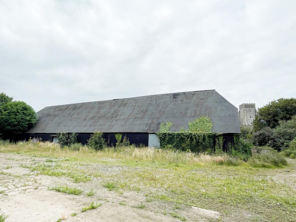 Lot: 158 - REDEVELOPMENT OPPORTUNITY - PLANNING CONSENT FOR TWO NEW BUILD DWELLINGS AND SEVEN BARN CONVERSIONS - Rear of large barn